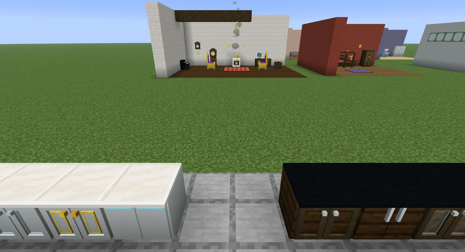 Kitchen cabinets in white and dark oak, each in a different door style
